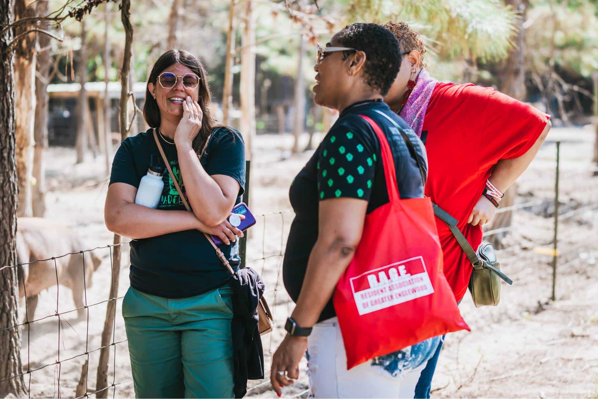 group of multiracial equitable food oriented development members talking on a farm tour