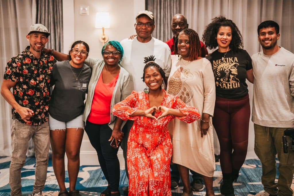 groups of black latino and asian efod members at an event