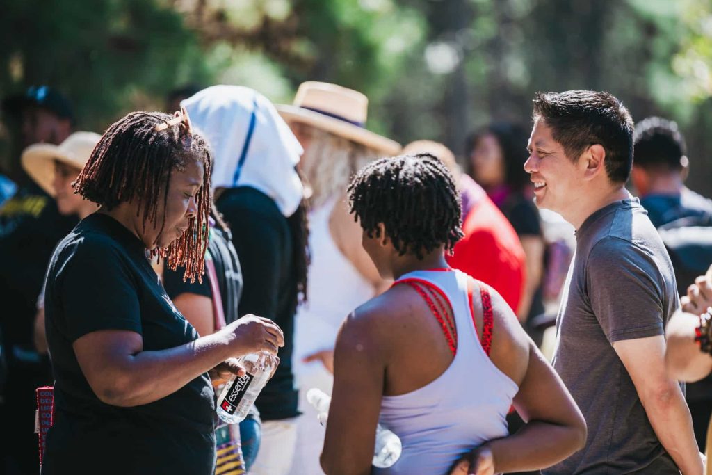 photo of multiracial members of equitable food oriented devlopment, latino asian and black